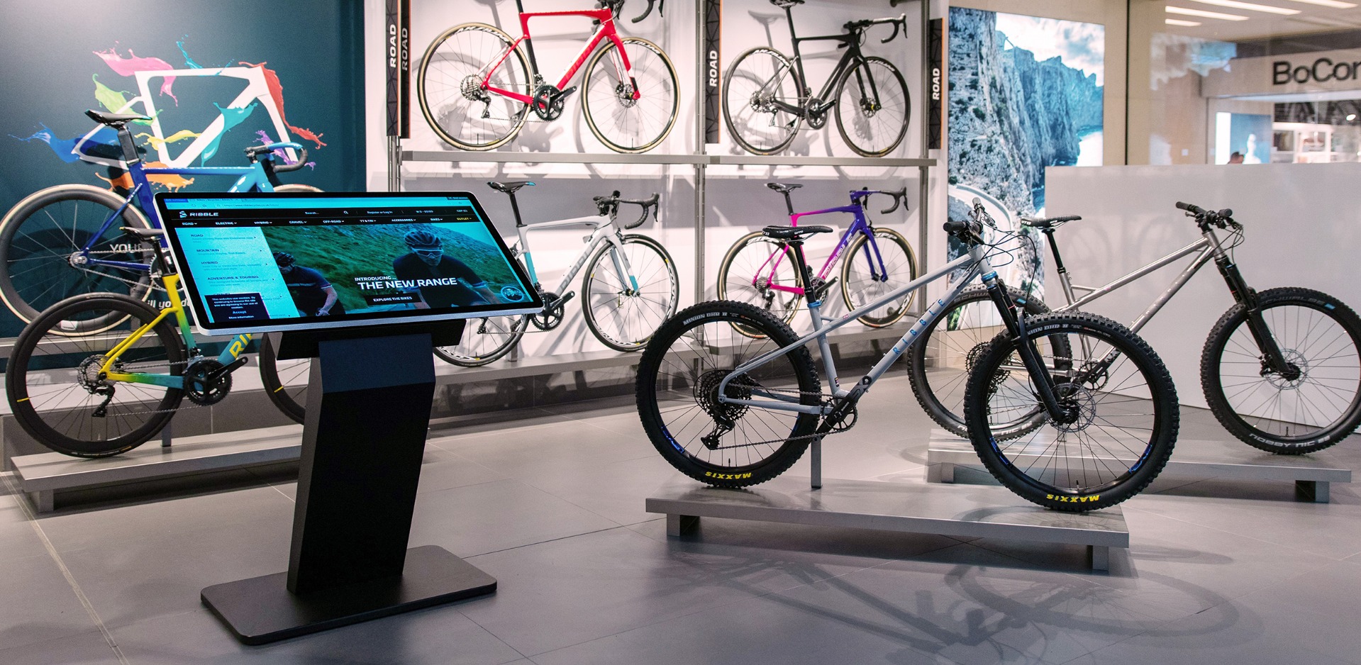 PCAP touch screen kiosk installed in a retail bicycle showroom