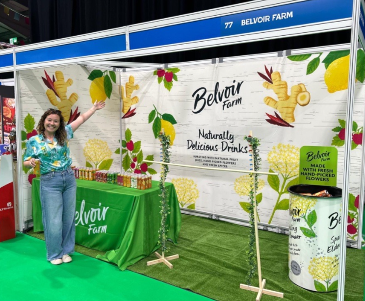 Food and beverage exhibition corner stand with ShellTex seamless graphics
