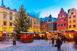 Beautiful snowy winter scenery of Christmas holiday fair at the Big Square (Stortorget) in the Old Town</body>
