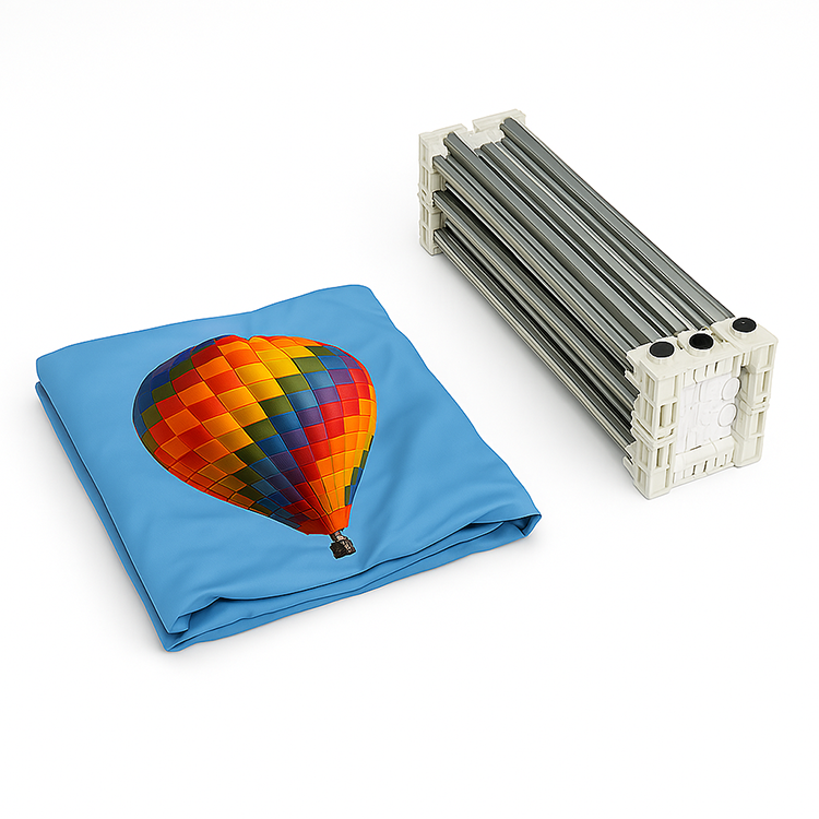 A picture of the Fabric SEG Pop-up frame when folded down. A folded fabric print is shown next to the image