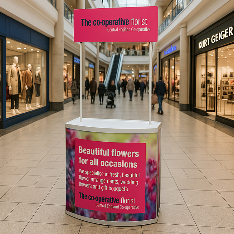 A picture of a promotional counter within a shopping centre environment